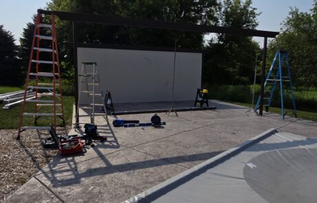 insulated patio cover installation in Big Bend WI with frame and TV wall rough-in