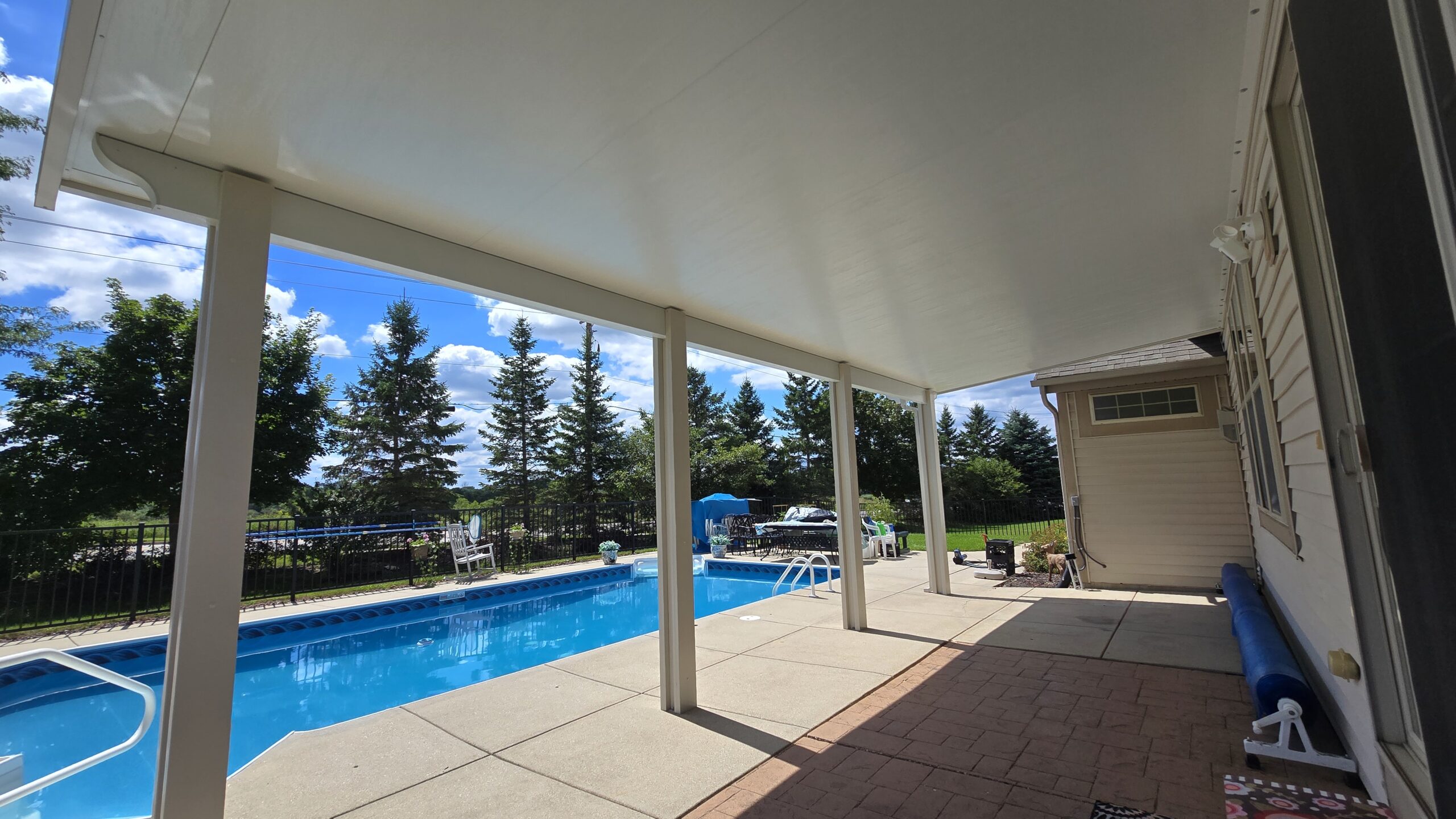 attached insulated patio cover in New Berlin WI with gutters and downspouts